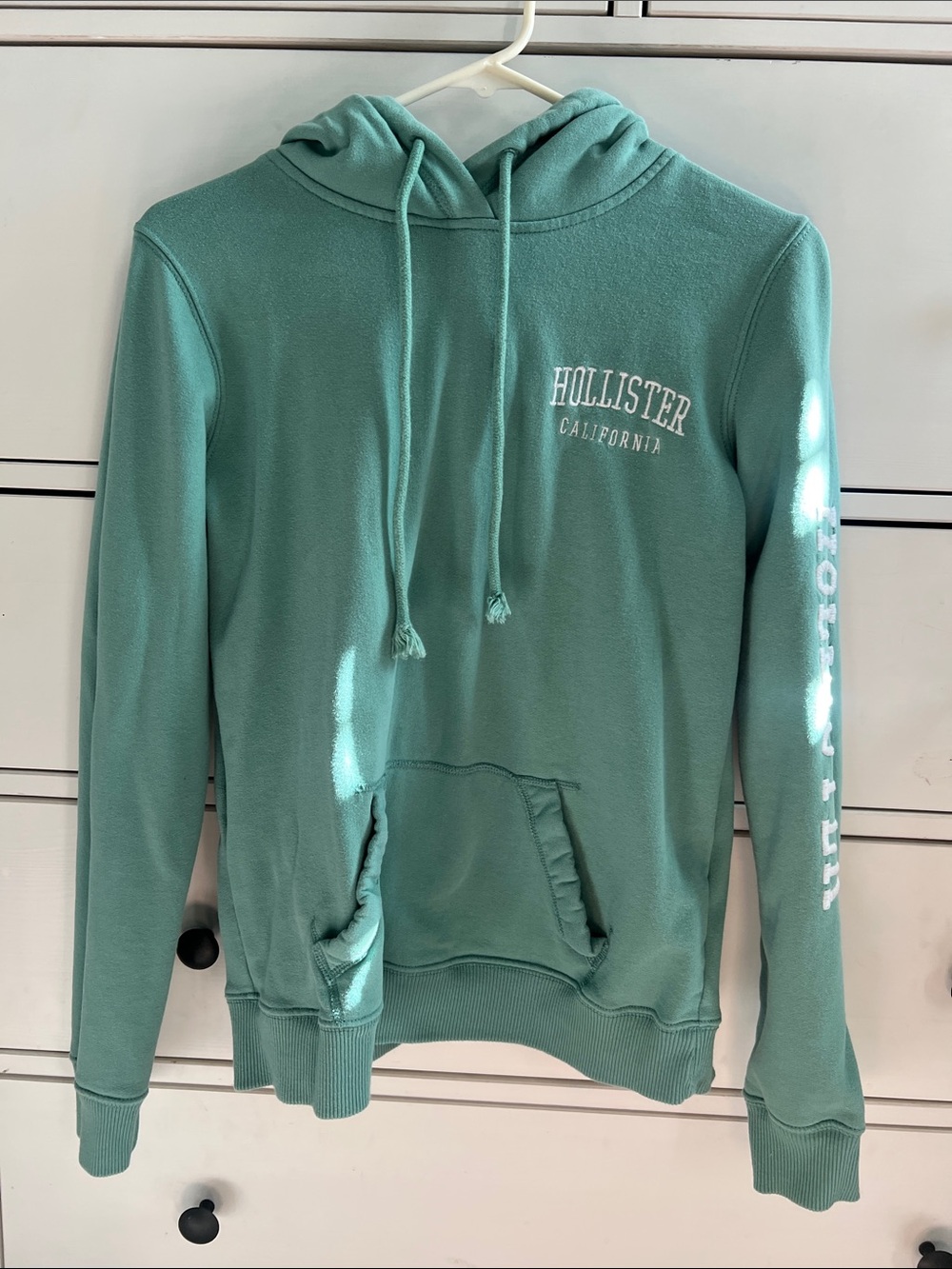 Hollister Women’s Teal Green Hoodie with White Logo